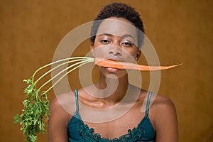 Woman with a carrot in her mouth