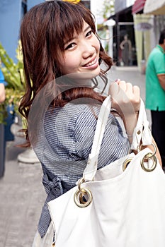 Woman carry bag shopping.