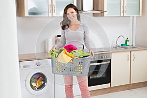 Woman Carrying Laundry Basket