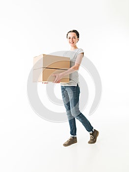 Woman carrying moving boxes