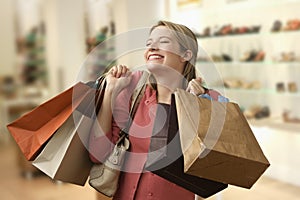 Woman Carrying Shopping Bags