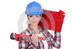 Woman carrying tool box