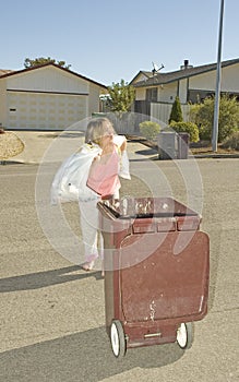 Woman carrying trash