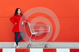 Woman with Cart Ready for Shopping Spree on Sale Season