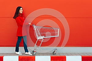 Woman with Cart Ready for Shopping Spree on Sale Season