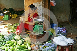 Woman cashing up photo