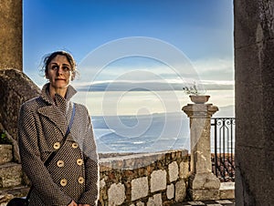 Woman in castelmola with sky background