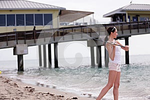 Woman casting a fishing pole