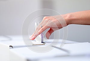 Woman casts her ballot at elections