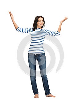 Woman in casual clothes showing direction