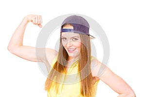 Woman casual style showing off muscles biceps