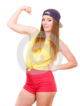 Woman casual style showing off muscles biceps