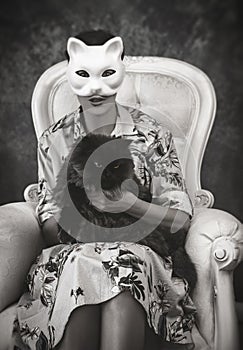 A woman with a cat mask photo