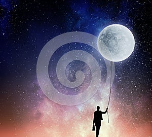 Woman catching moon . Mixed media