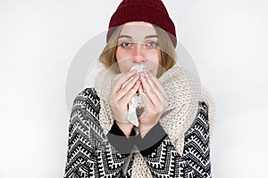 Woman Caught Cold. Sneezing into Tissue