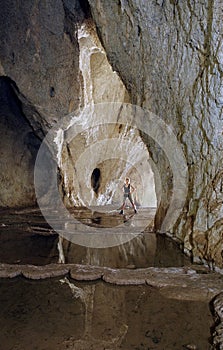 Woman in cave