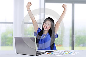 Woman celebrates her accomplishment