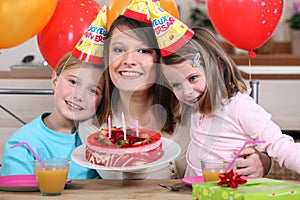 Woman celebrating with her kids