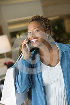 Woman on Cell Phone in furniture store
