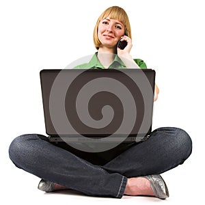 Woman with cellphone and laptop