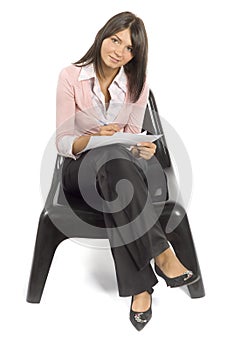 Woman on the chair doing notice