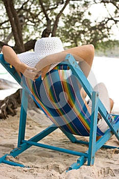 Woman in chaise longue photo