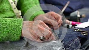 Woman with chalk marks fabric