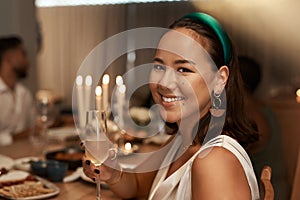 Woman, champagne and party portrait with dinner to celebrate new year, friends get together and social event with