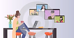 Woman chatting with friends during video call people having online conference meeting communication concept