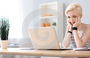 Woman chatting on the laptop