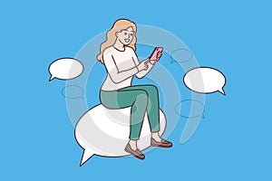 Woman is chatting on mobile phone, sitting on speech bubble and typing SMS on social networks