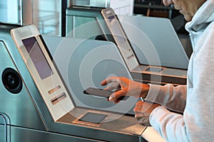 Woman is check-in with smart phone in airport gate