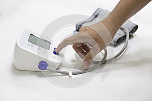 Woman checking accuracy blood pressure monitor,concept:Health care and Medical,Doctor Measuring  patient arterial