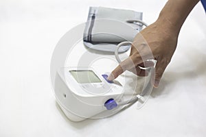 Woman checking accuracy blood pressure monitor,concept:Health care and Medical,Doctor Measuring  patient arterial