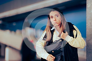 Woman Checking her Bag Not Finding Id and Car Keys photo