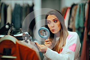 Woman Checking Price Tag with a Magnifier