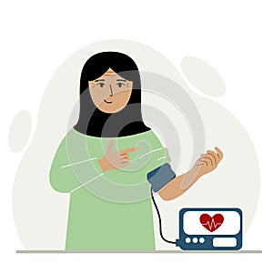 Woman checks blood pressure. healthcare concept. Blood pressure measurement, digital tonometer. Health monitoring.