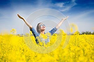Woman cheering in the field