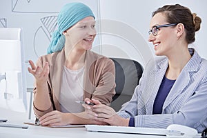 Woman after chemo at work photo