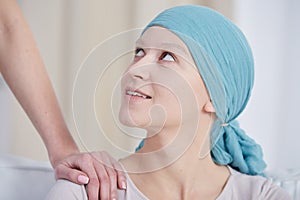Woman after chemotherapy wearing headscarf