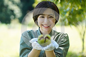 Woman with chestnuts