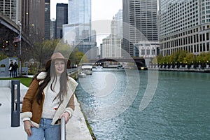 A woman in chicago by the river