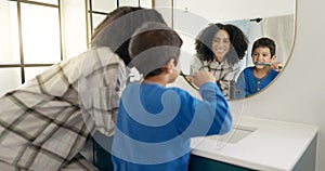 Woman, child and brushing teeth in bathroom with mirror, dental care in home with toothpaste, water and hygiene. Kid