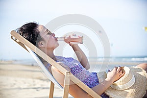 Woman chilling on the beach