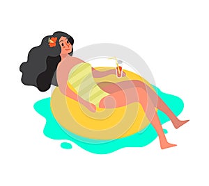 Woman chilling in a pool. Girl relaxing on inflatable mattress