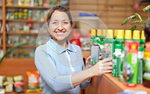 Woman chooses agricultural chemistry at store