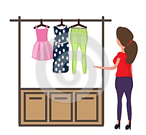 A woman chooses clothes to dress. women`s clothing. Vector illustration