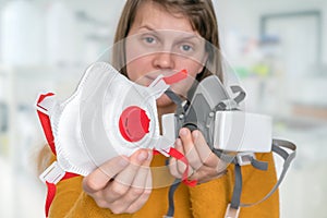 Woman chooses FFP3 respirator mask photo