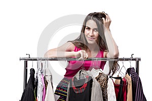 The woman choosing clothing in shop isolated on white