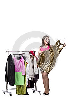 The woman choosing clothing in shop isolated on white